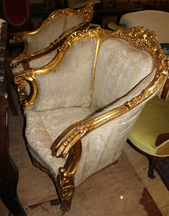 A pair of Louis XV style giltwood armchairs